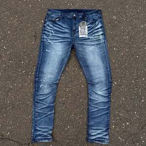 Hydraulic Men's Blue Distressed Slim Fit Stretch Denim Jeans